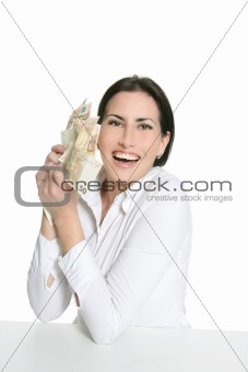 Euro notes in happy brunette woman hands