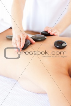Caucasian woman having a stone therapy