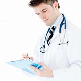 Portrait a charming male doctor writing notes against a white background