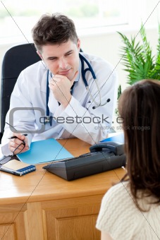 Charming doctor talking with his patient