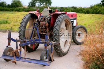 red tractor parked