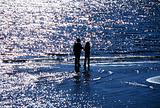 Children Silhouetted on the Water