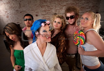 Eccentric woman hanging out with party kids