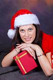 young girl in red with christmas clothes and the gift box