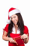young girl in red smiling with christmas clothes and gift box