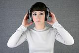futuristic fashion woman hearing music headphones