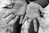 children girl beach sand hands facing camera