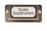 Under Construction File Drawer Label Isolated on a White Background.