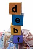 cash debt in toy play block letters