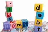 home debt risk in toy play block letters