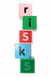 risks in toy play block letters