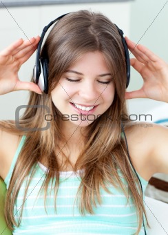 Good-looking girl listening to music 