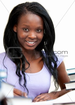 Afro-american woman studying at home 