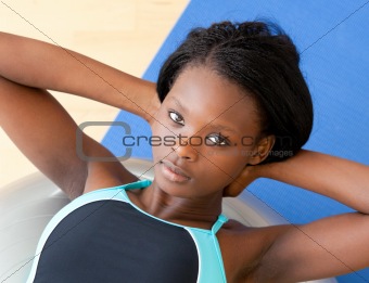 Concentrated woman doing fitness