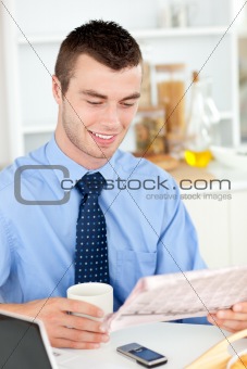 Good-looking man reading a book