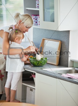 Concentrated mother and child cooking