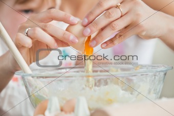 Mother and cute child baking cookies 