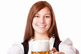 Happy smiling Bavarian woman in dirndl holding Oktoberfest beer stein
