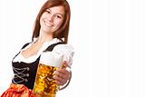 Happy smiling woman in dirndl dress holding Oktoberfest beer stein