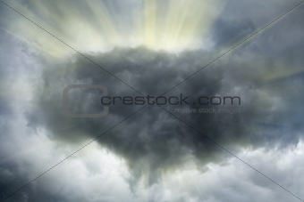 Sun rays in a dramatic stormy sky