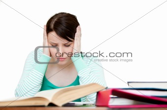 Frustrated teenager doing her homework