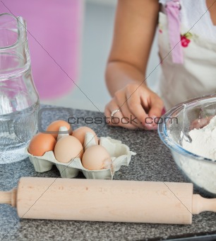 Mother and child baking cookies