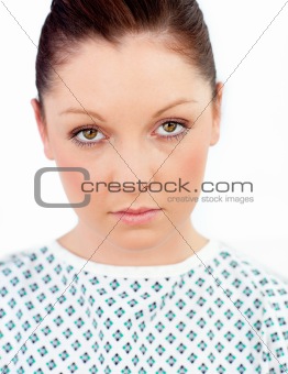 Sick female patient looking at the camera 