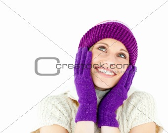 Glowing woman wearing cap and gloves against white background