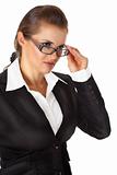 modern business woman straightening eyeglasses