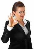 smiling modern business woman showing ok gesture
