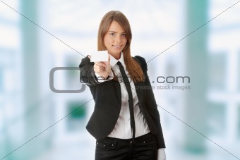 Beautiful young business woman with blank business card