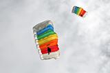 two brightly colored parachutes