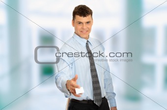 Business man with blank business card