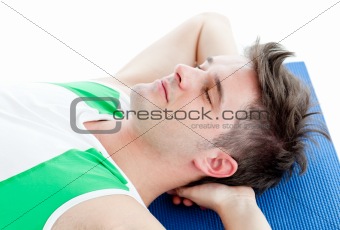 Relaxed man doing fitness 