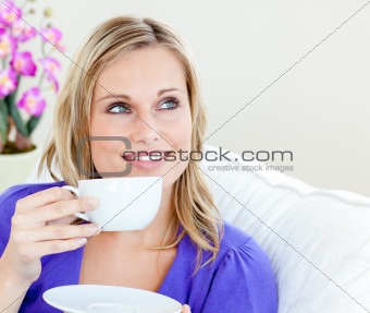 Young woman holding cup