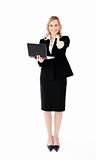 Businesswoman holding laptop
