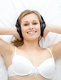 Charming woman listening to music
