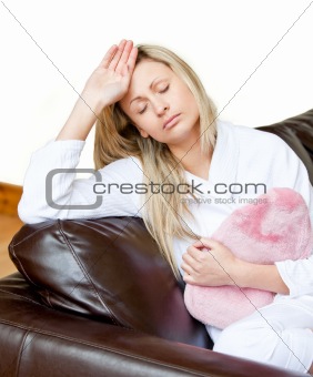 Exhausted woman have a headache against a white background