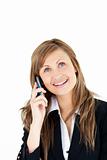 Cheerful blond businesswoman talking on phone 
