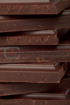Stack of dark chocolate close up