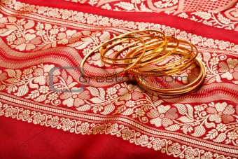 Indian sari with golden bangles