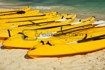 Kayaks on the beach sand