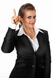 modern business woman with rised finger. idea gesture