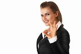 smiling modern business woman showing ok gesture