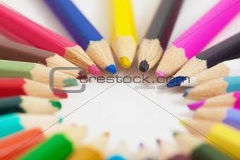 Several colored pencils arranged in circle