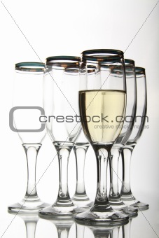 Wine goblets on mirror table