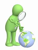 Puppet with a magnifier and Earth