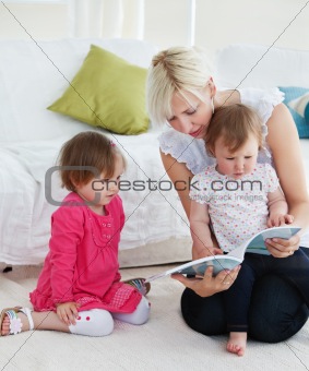 Small family reading a book