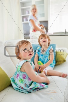 Blond mother having fun with her young daughters