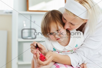 Mother taking care of her girl